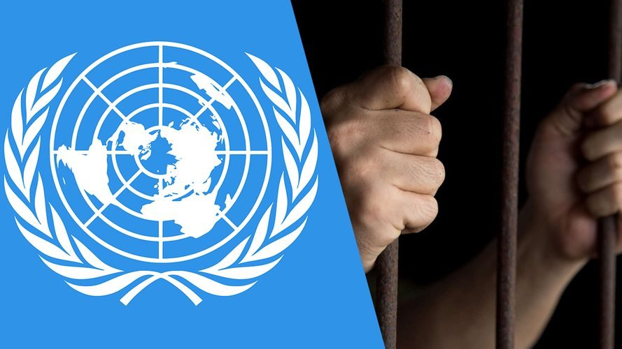 UN emblem alongside hands gripping prison bars — symbolising ICET's dual mandate of law and detention monitoring